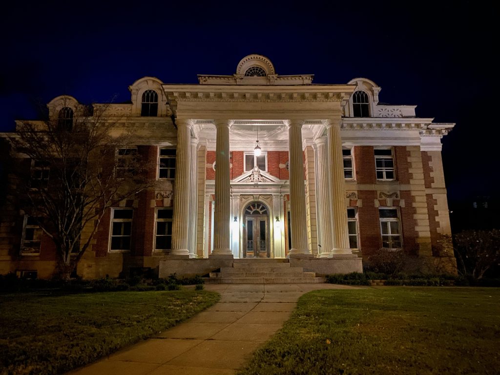 A majestic photo of the Wheeler Mansion in 2021 at night